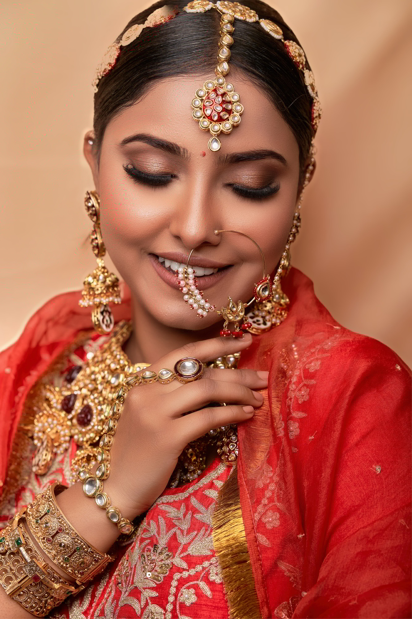 Beautiful Bridal woman in wedding dress and cultural jewelry